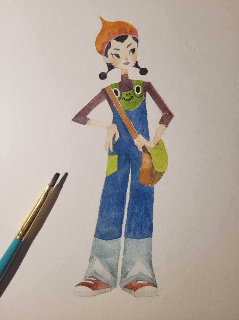 a girl in overalls